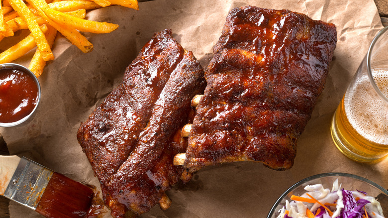 ribs at restaurant with fries and beer