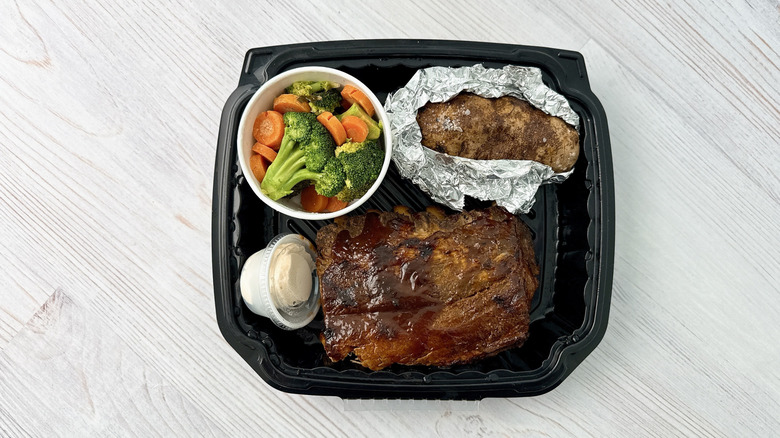 Texas Roadhouse Ribs with baked potato and veggies