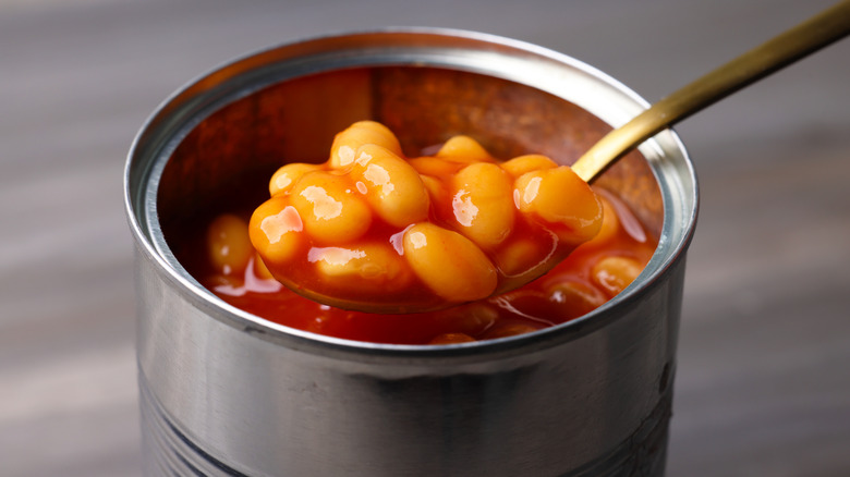 Canned baked beans with a spoon