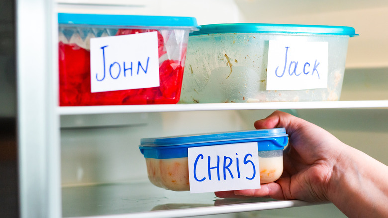 Labeled storage containers in a refrigerator