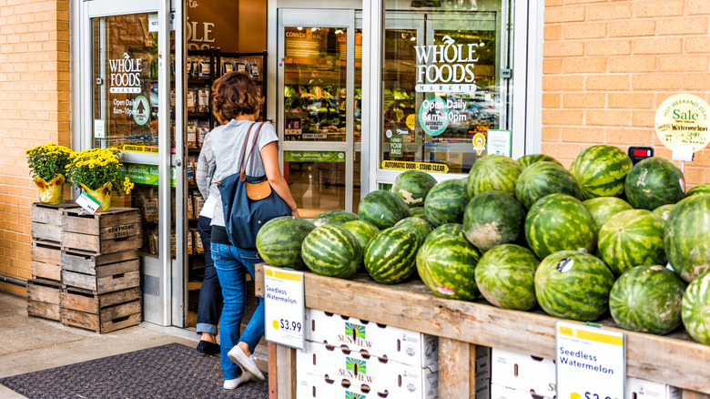 shopper entering Whole Foods store