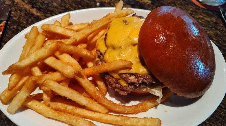 The All-American Smash Burger and fries at BJ's Restaurant