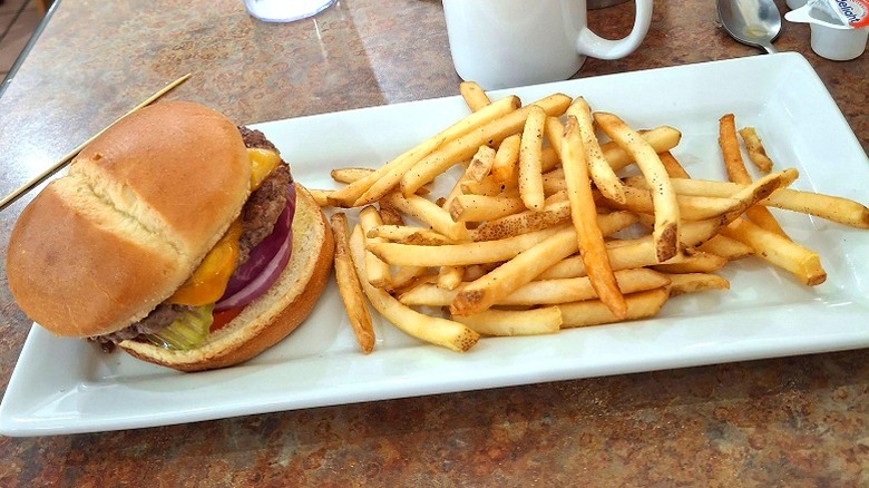 Plate with a Perkins cheeseburger and French fries