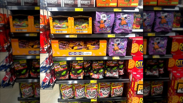 Shelves of Halloween candy inside Grocery Outlet store, including Nerds, Reese's and mixed candy bags