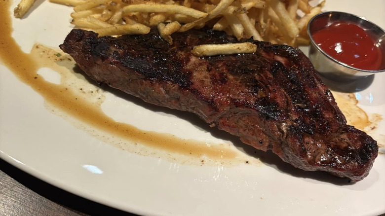 J. Alexander's Steak 'N' Fries on a plate with ketchup.