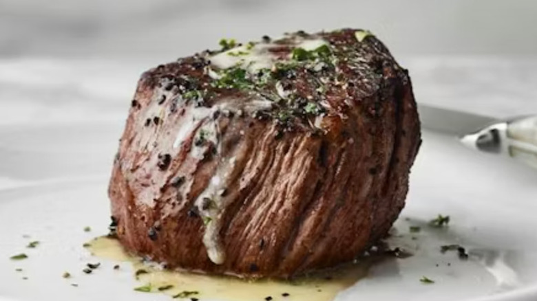 Fleming's Prime Steakhouse petite filet mignon on plate.