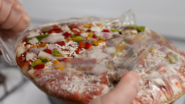 a frozen pizza in a wrapper