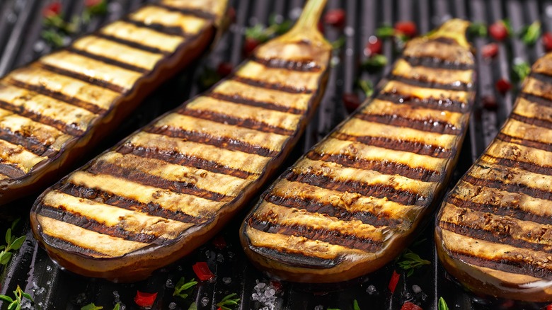 Halved eggplants with grill marks