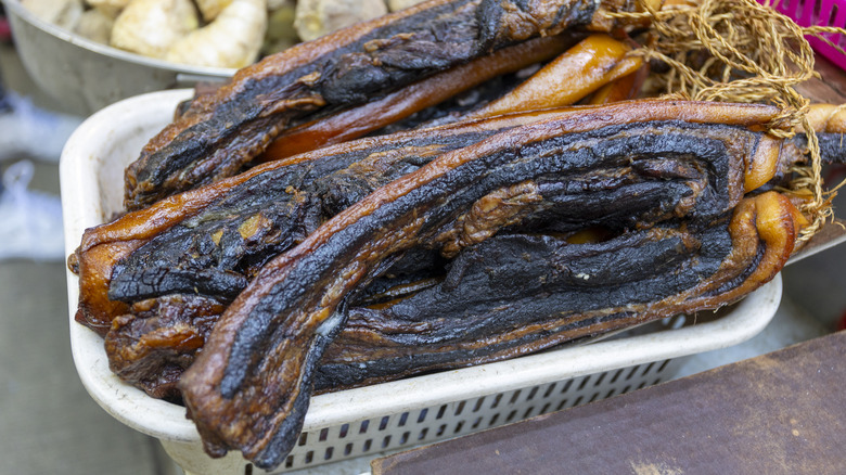 Chinese bacon in a white basket.