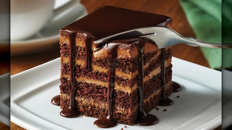 Silver fork cutting into Olive Garden's chocolate lasagna dessert