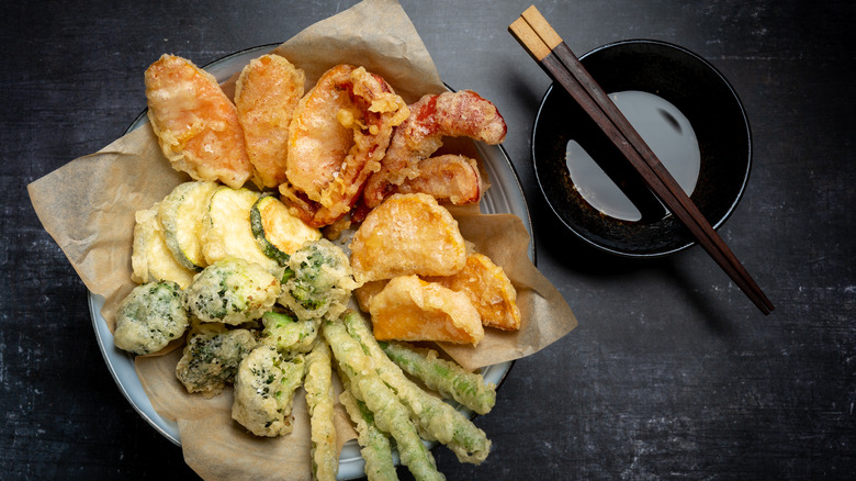 tempura foods with chopsticks