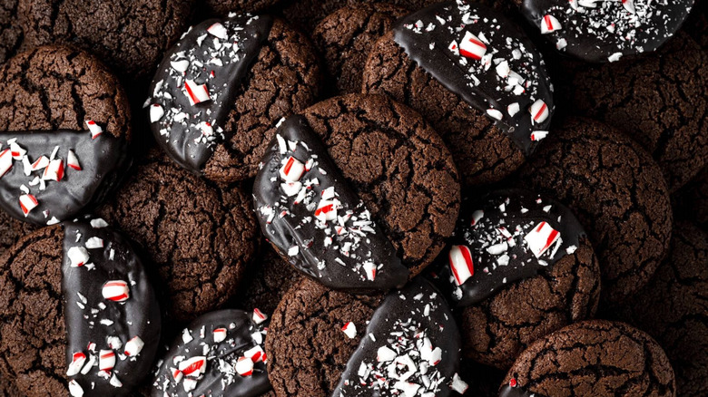 Chocolate peppermint cookies are piled on top of one another