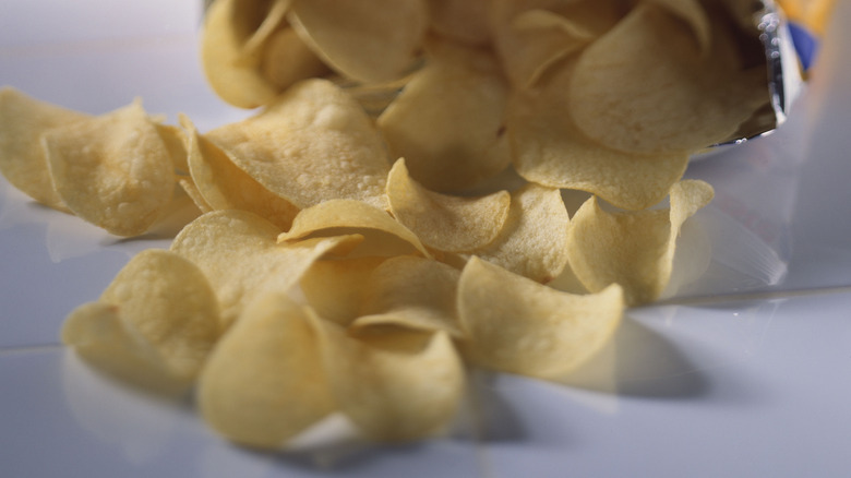 potato chips spilling from bag