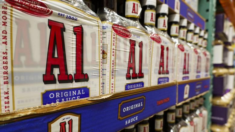 Cases of A1 steak sauce on display on a store shelf