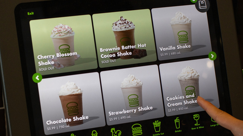 Someone selects a Shake Shack milkshake off a virtual menu