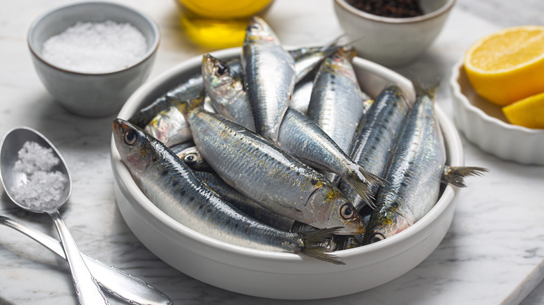 Sardines in a bowl with salt