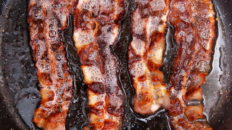 Bacon is grease in a pan