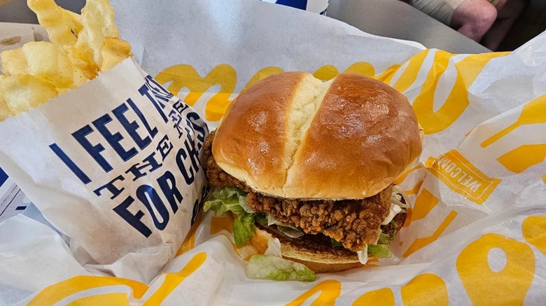 A spicy chicken sandwich and fries in a Culver's basket