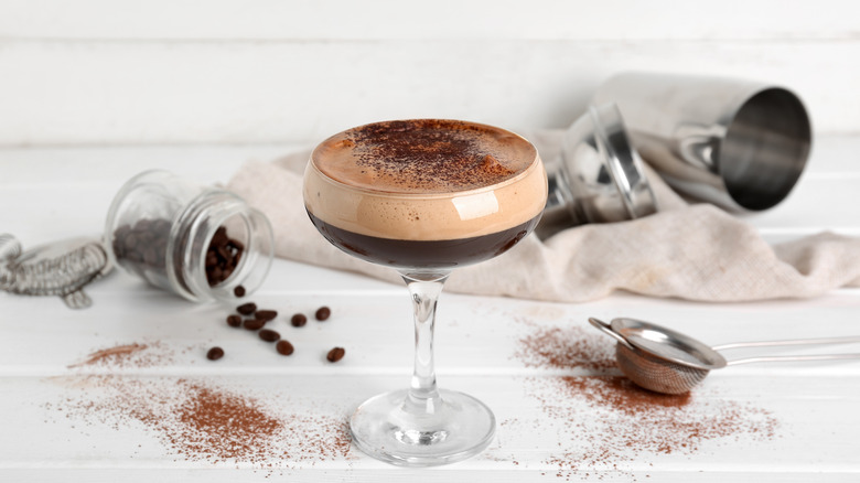 espresso martini with cocoa powder on top