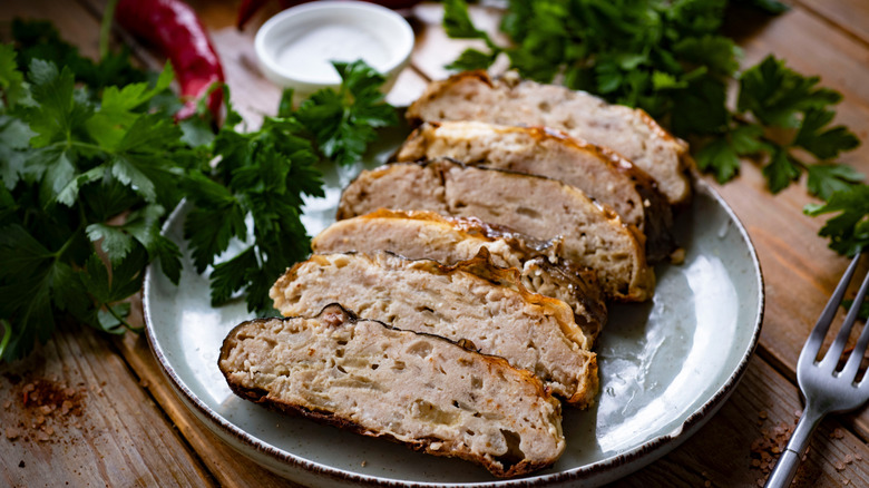 Sliced fish loaf on plate