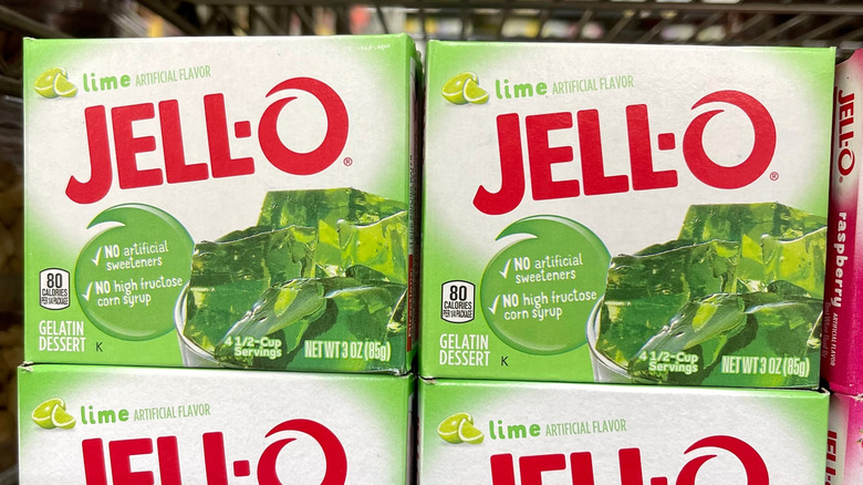 Boxes of lime Jell-O on a supermarket Shelf
