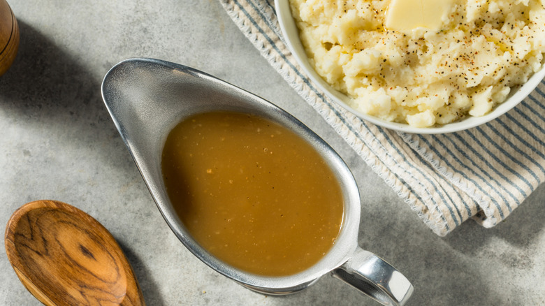Gravy boat with mashed potatoes