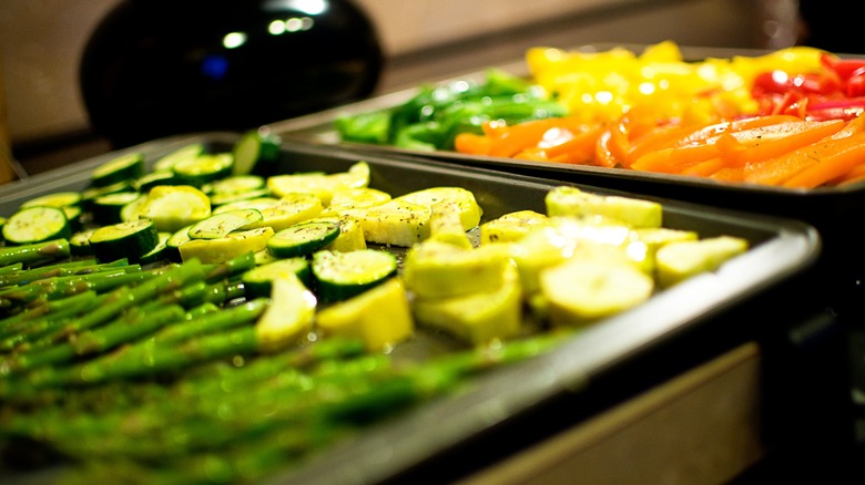 prepped vegetables on a metal sheet pan