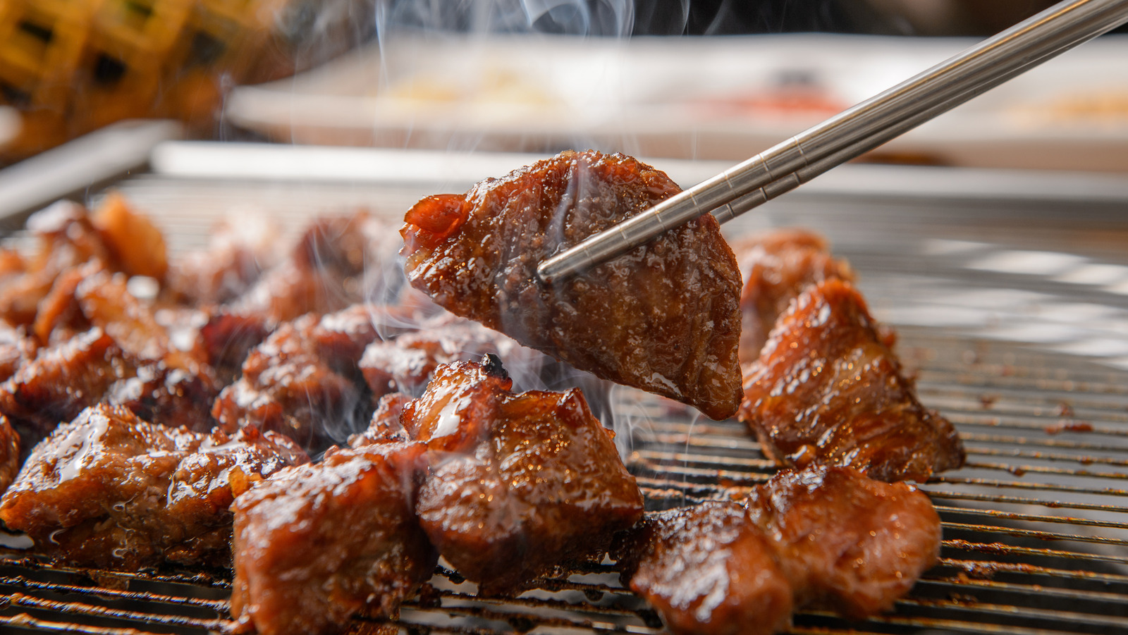 The Cooking Tip To Get The Most Out Of Your Meat At A Korean BBQ Restaurant