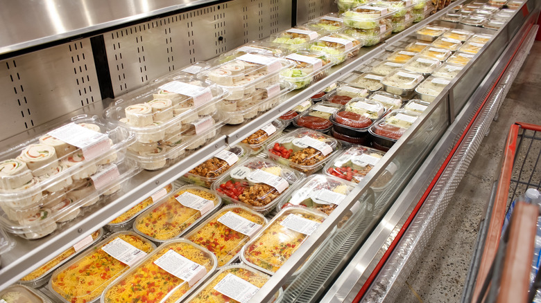 A display of prepared meals in a Costco deli