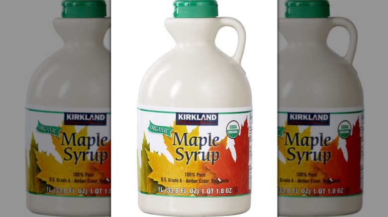 Packaging of Kirkland Signature Organic Pure Maple Syrup on white background