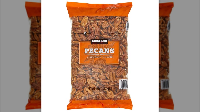 Packaging of Kirkland Signature Pecan Halves on white background