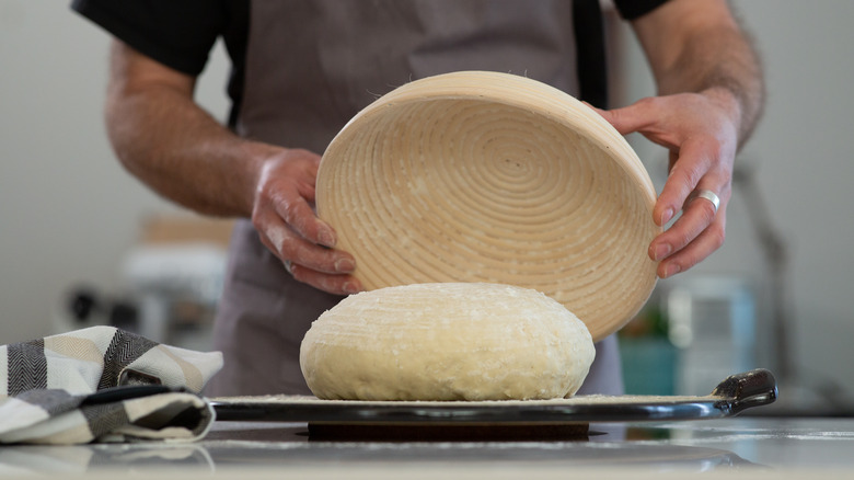 baker proofing bread dough