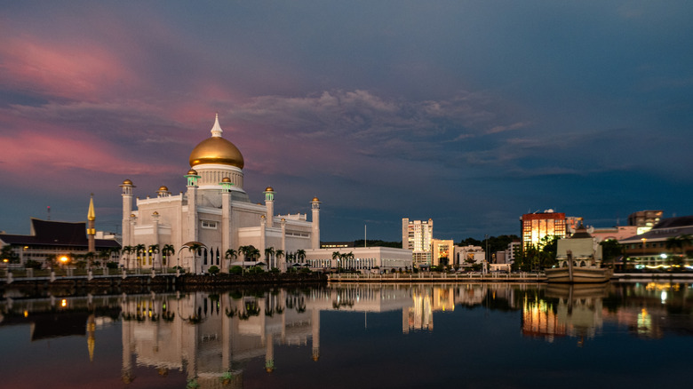 Cityscape in Brunei with mosque and river