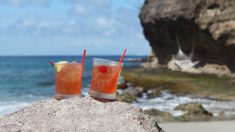 Two rum cocktails on a Saint Lucia beach