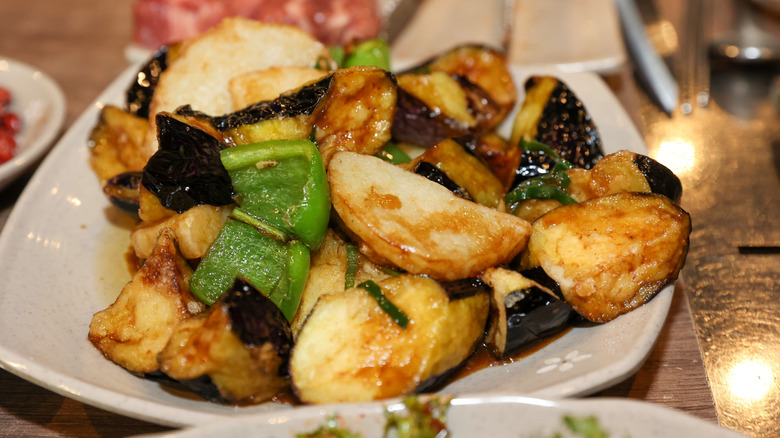 Chinese stir fried potatoes with green peppers