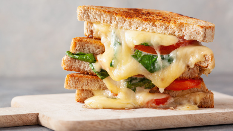 Gooey grilled cheese with lettuce and tomato