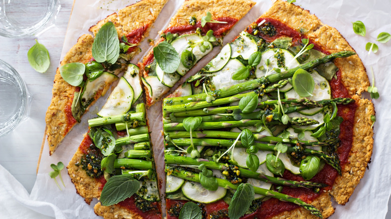 Pizza with cauliflower base and asparagus
