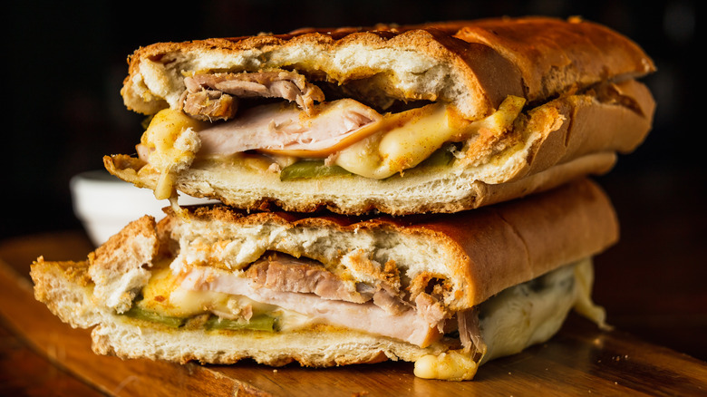 Cuban sandwich on cutting board