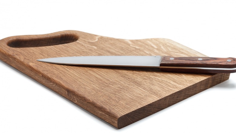 knife laying on cutting board