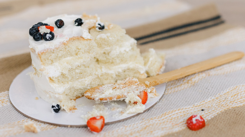 A cake that's been cut messily