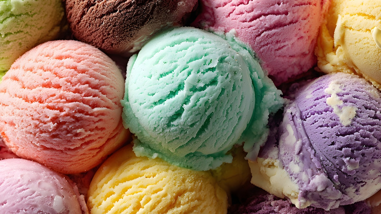 A close-up of different flavor scoops of ice cream