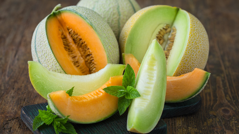 Orange and green honeydew melons