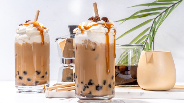Coffee boba drinks with caramel sauce topping