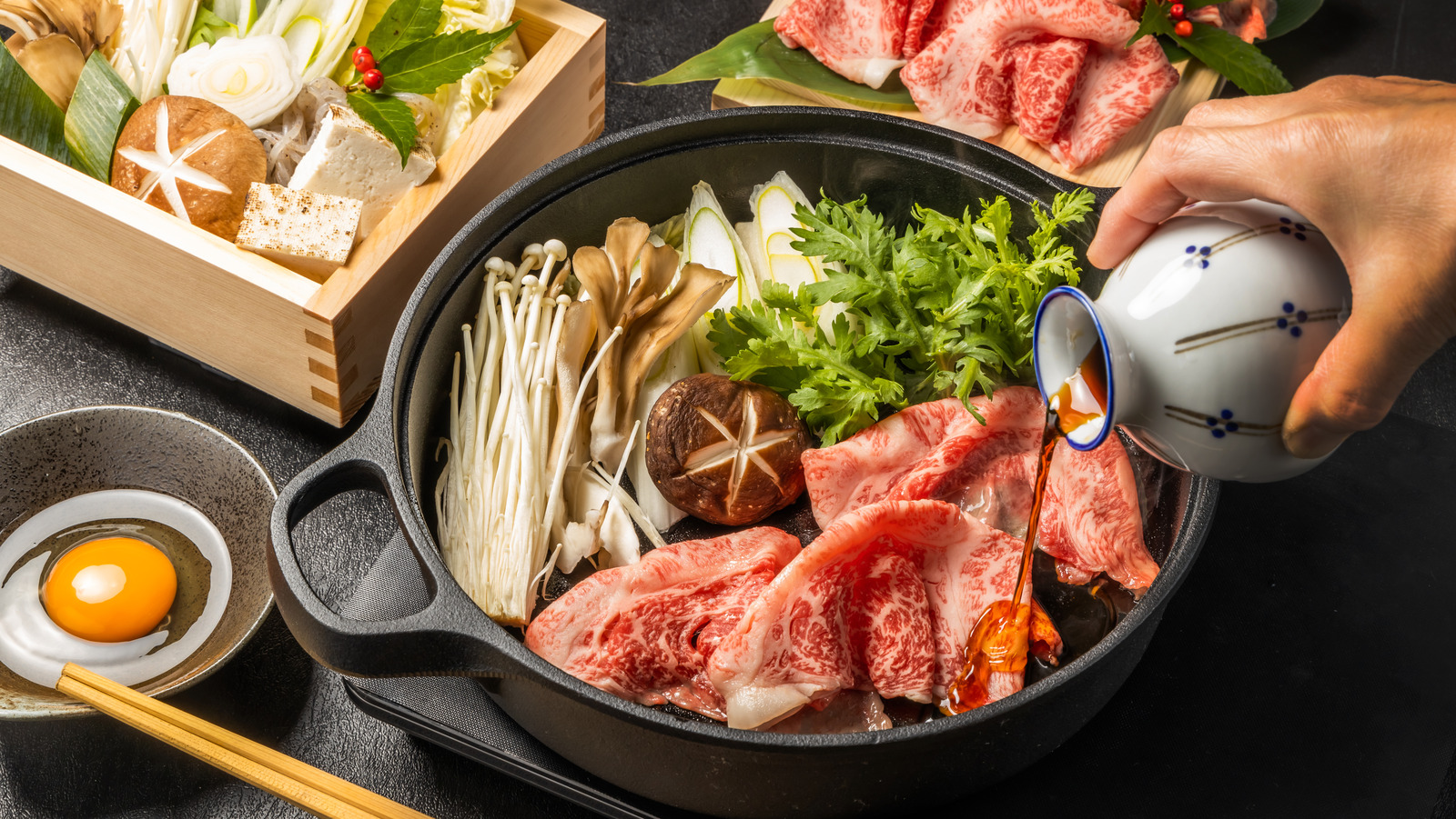 https://www.tastingtable.com/img/gallery/the-difference-between-sukiyaki-and-shabu-shabu-hot-pots/l-intro-1688678470.jpg