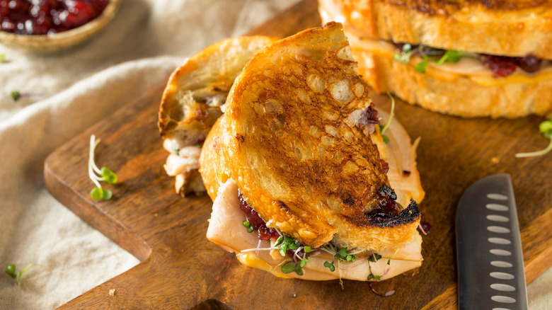 A homemade Thanksgiving turkey panini with cranberry sauce