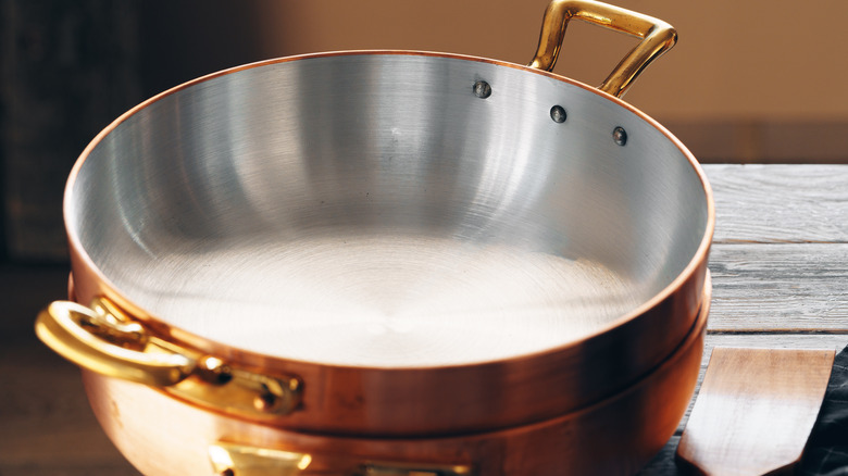 Stainless steel lined copper pan