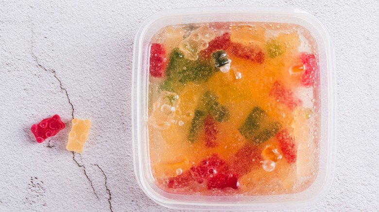 Gummy bears soaking in a tub of prosecco