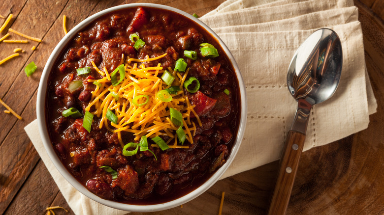 Bowl of chili on a table