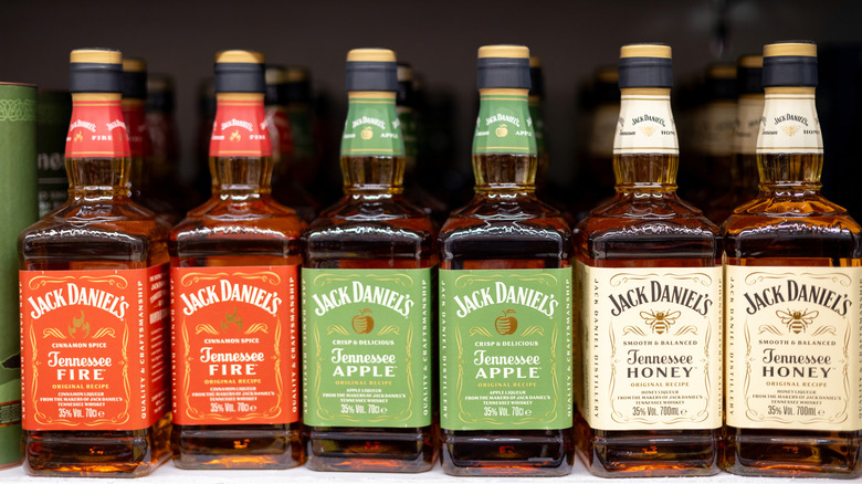 an array of Jack Daniel's varieties including fire and honey and apple
