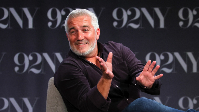 Paul Hollywood being interviews on stage